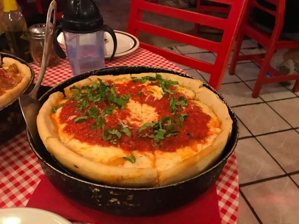 A deep dish pizza from Don Chendo Playa del Carmen