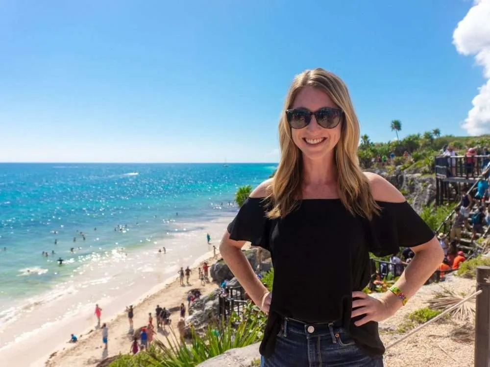 Me standing in front of the beach at the Tulum Ruins