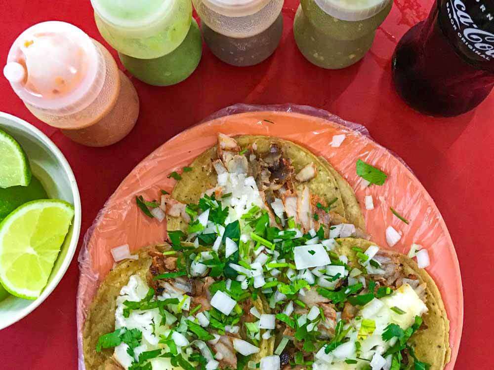 A plate of al pastor tacos at El Nero Taqueria Playa del Carmen