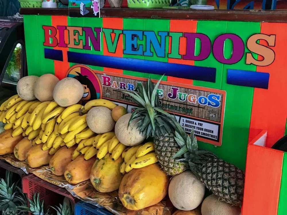 A pile of fresh fruit at the entrance to Nativo Juice Bar
