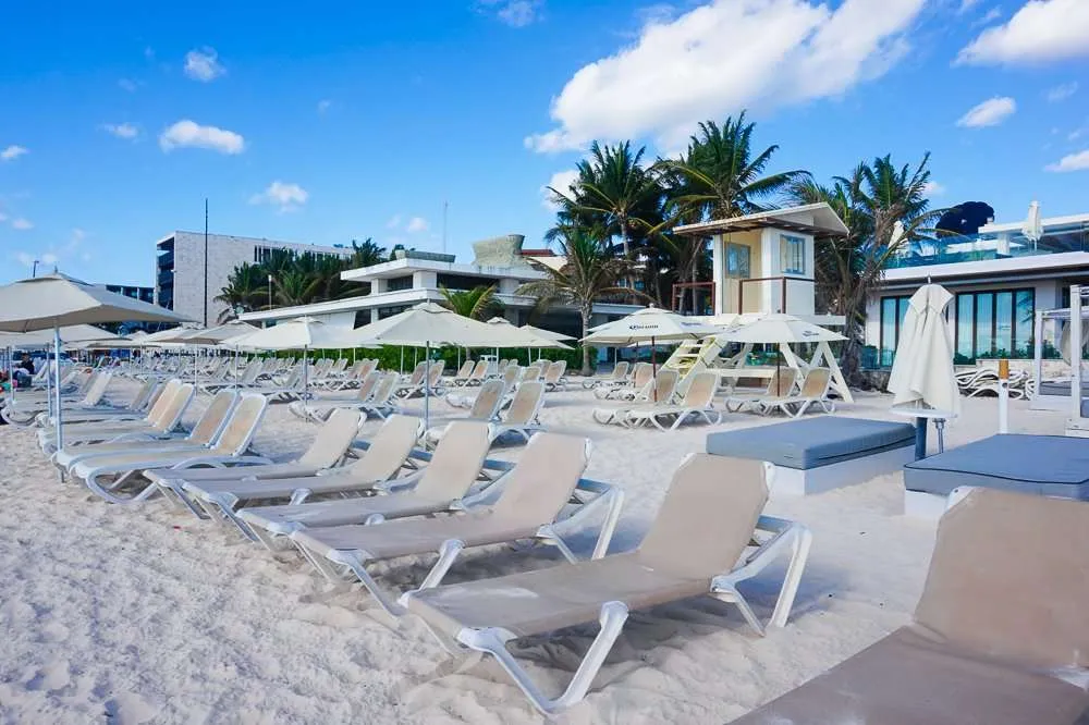 Lounge chairs and beach umbrellas at Mamitas Beach Club Playa del Carmen