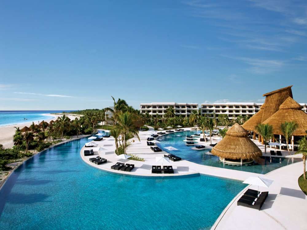 The pools and beachfront at Secrets Maroma Beach Riviera Cancun