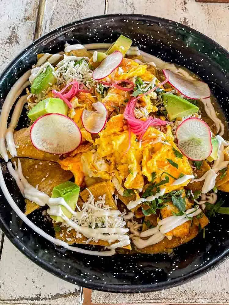 A plate of chilaquiles at Lido Beach Club Beachfront Restaurant in Playa del Carmen