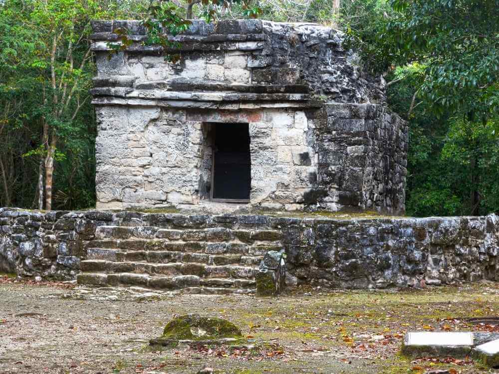 A stone structure at the San Gervasio Mayan Ruins in Cozumel Mexico