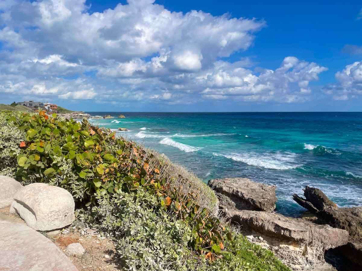 A beach on the eastern side of Isla Mujeres with rocks and waves