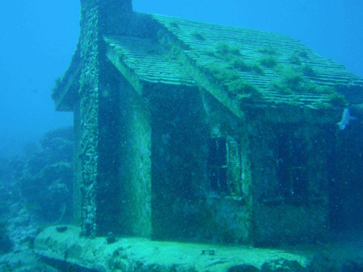 An underwater house at the MUSA Underwater Museum of Art in Isla Mujeres