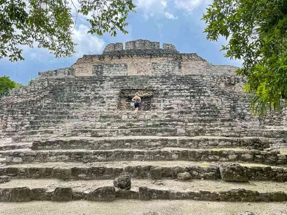 Me standing in front of a pyramid at the Chacchoben Ruins near Costa Maya