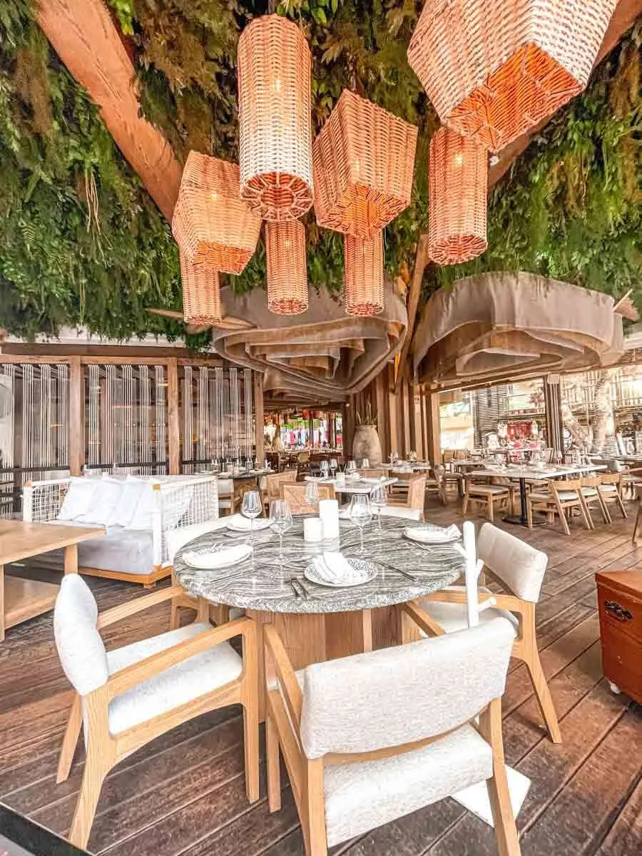 Tables and chairs at Ilios Greek Estiatorio Playa del Carmen