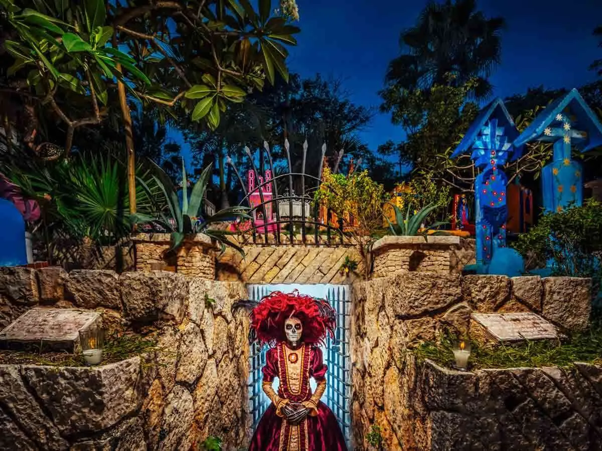 A woman dressed up as a Catrina in the cemetery at the Festival of Life and Death Traditions