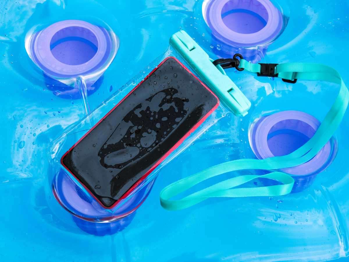 A waterproof phone pouch sitting on top of a pool float