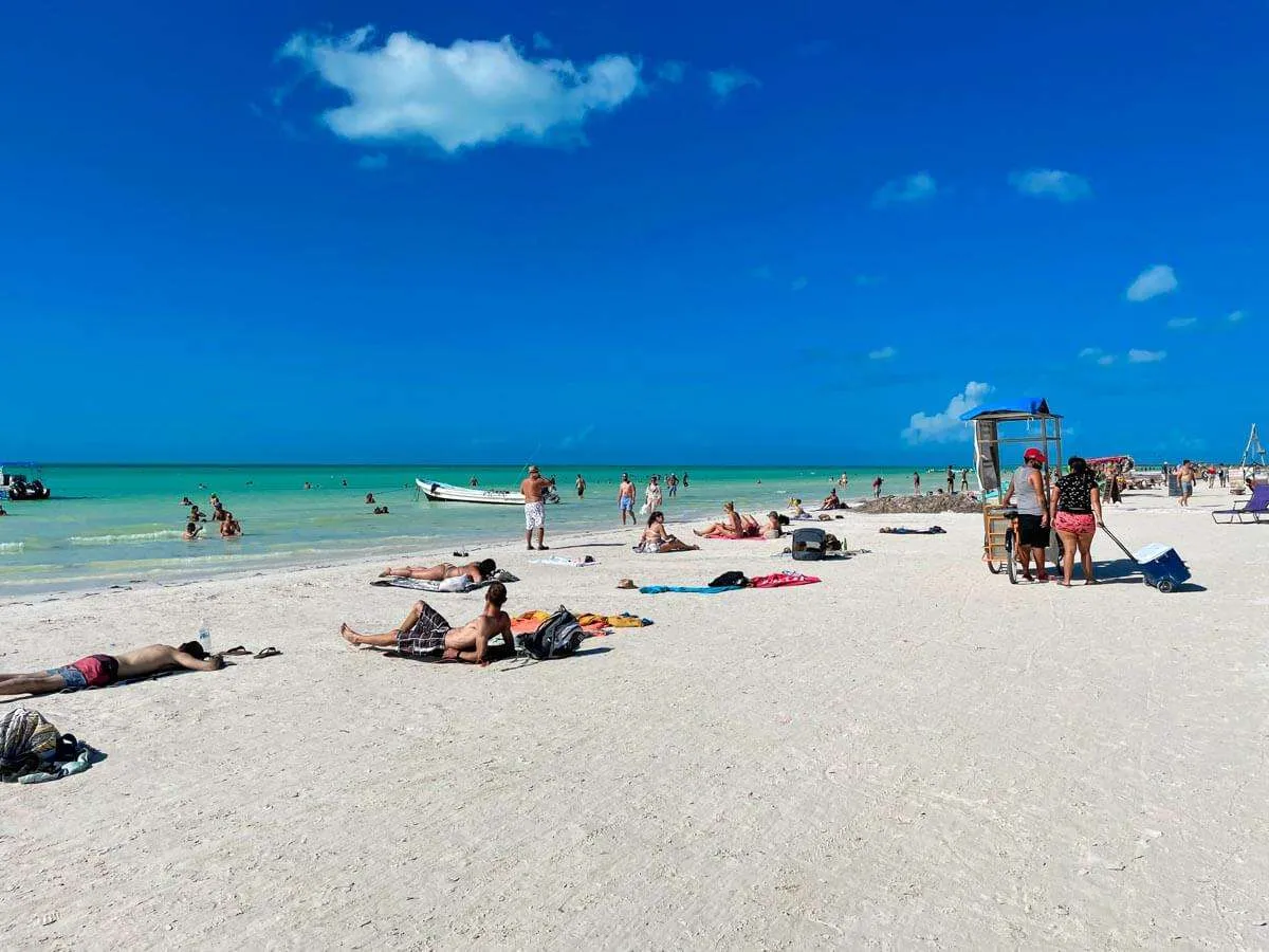 People lounging on the beach in Holbox Mexico