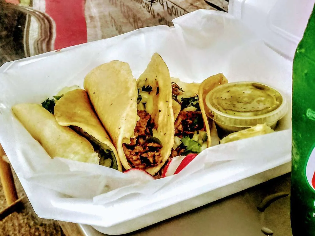 A styrofoam container filled with tacos from the Mercado Municipal in Holbox Mexico