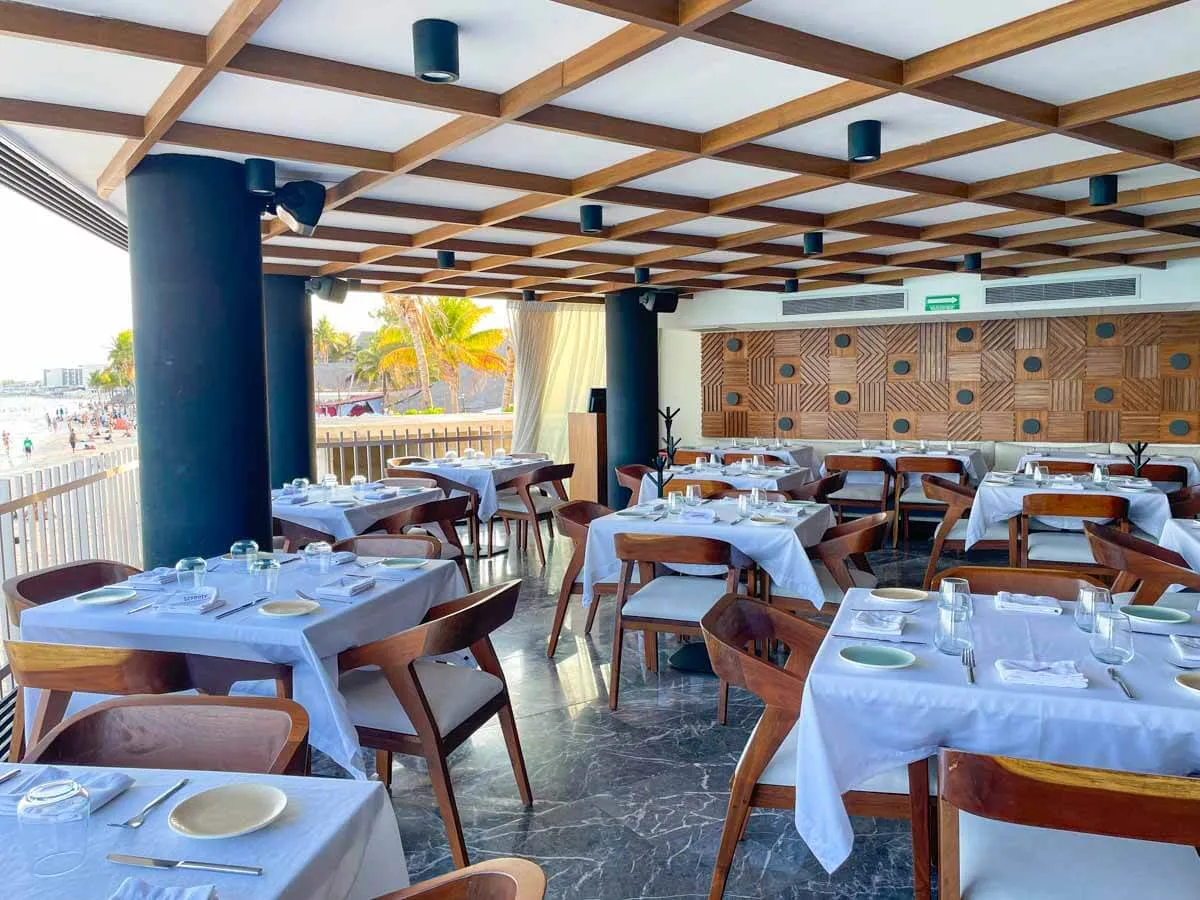 Tables and chairs at Piaggia Beachfront Restaurant Playa del Carmen