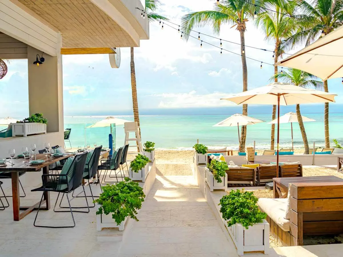 Tables and chairs in front of the beach at C-Grill Restaurant Playa del Carmen