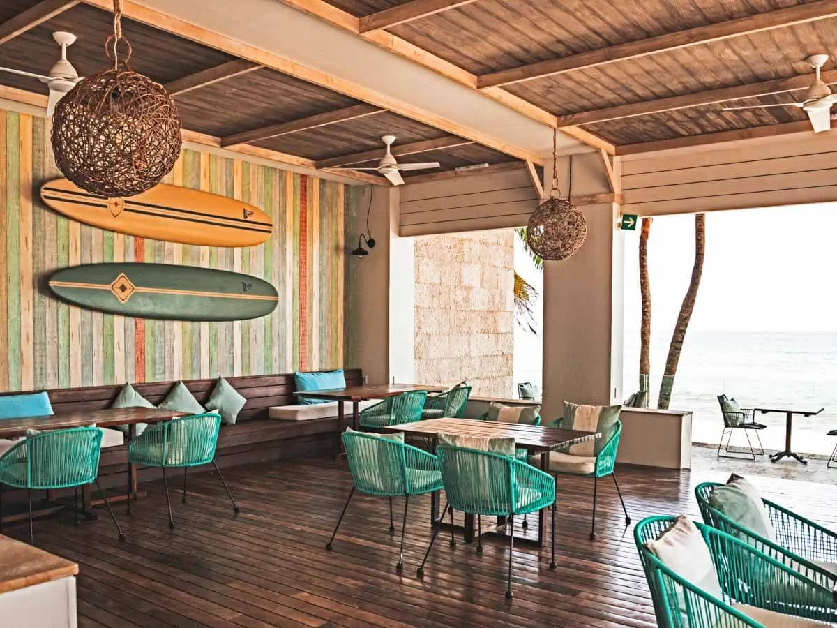 Tables and chairs in front of the beach at C-Grill Restaurant Playa del Carmen