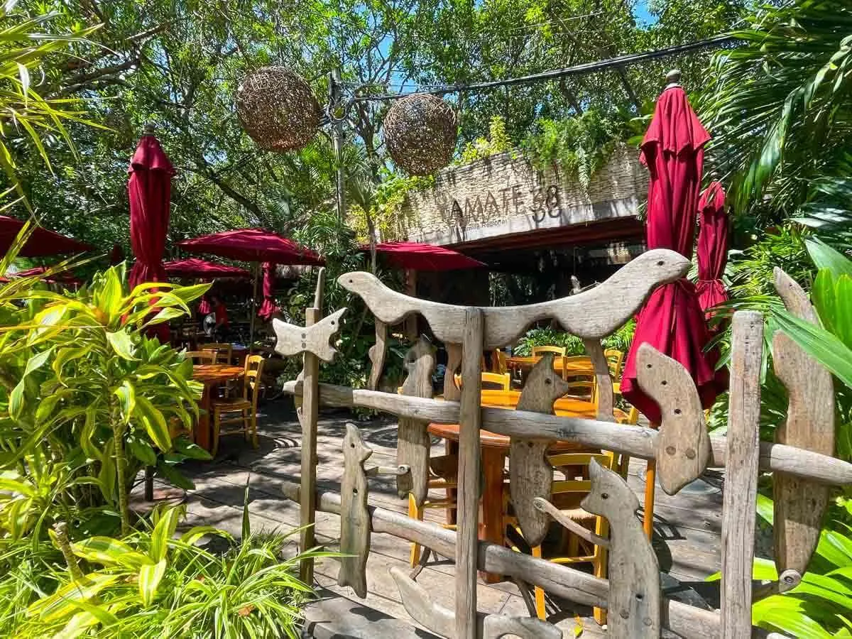Tables and chairs outside at Amate 38 Playa del Carmen