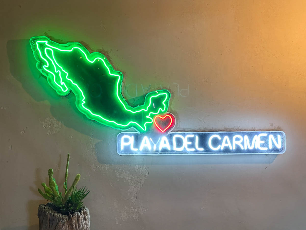 A neon Playa del Carmen sign