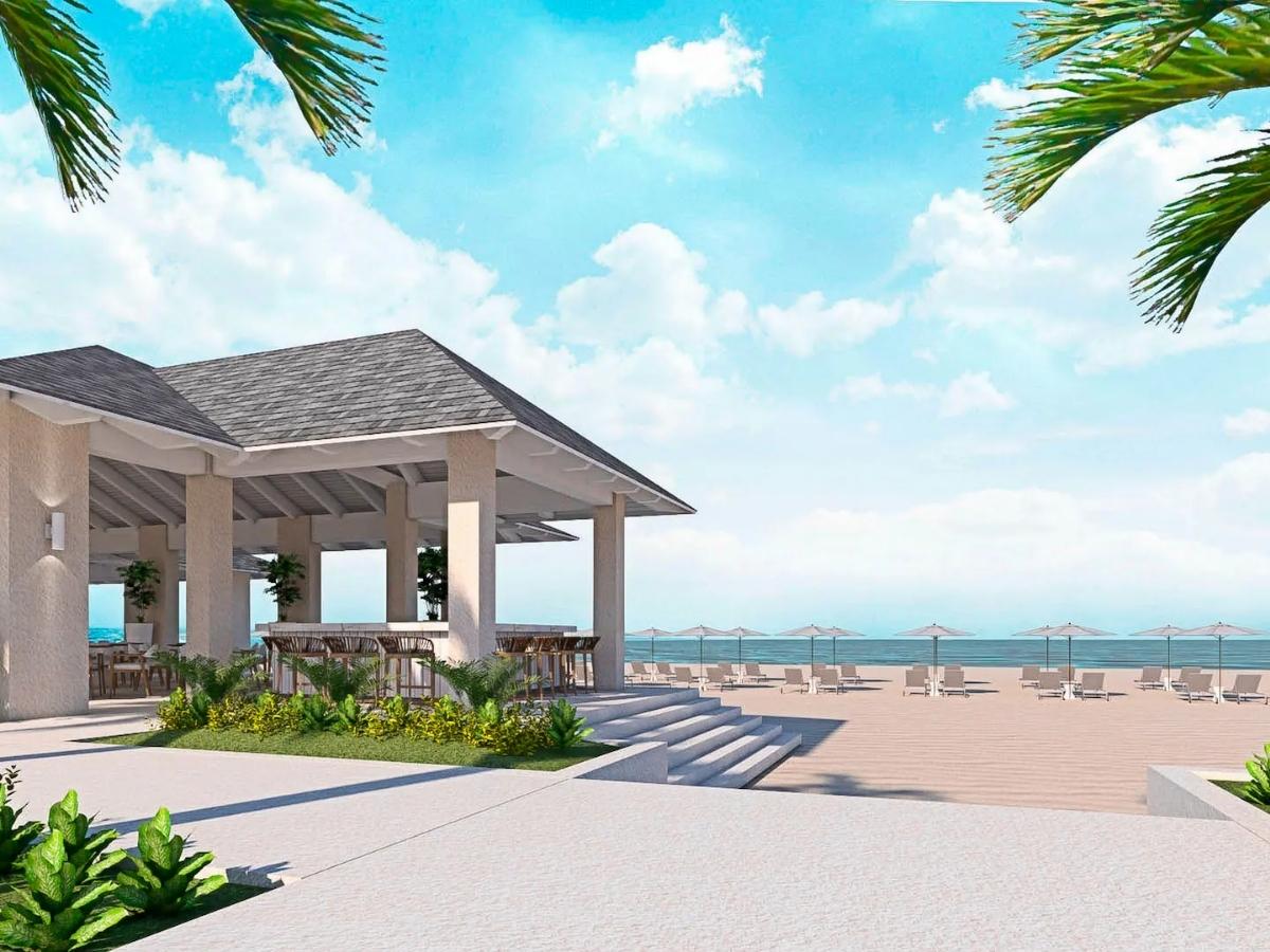 The beachfront area with lounge chairs at Melia Casa Maya Cancun Resort