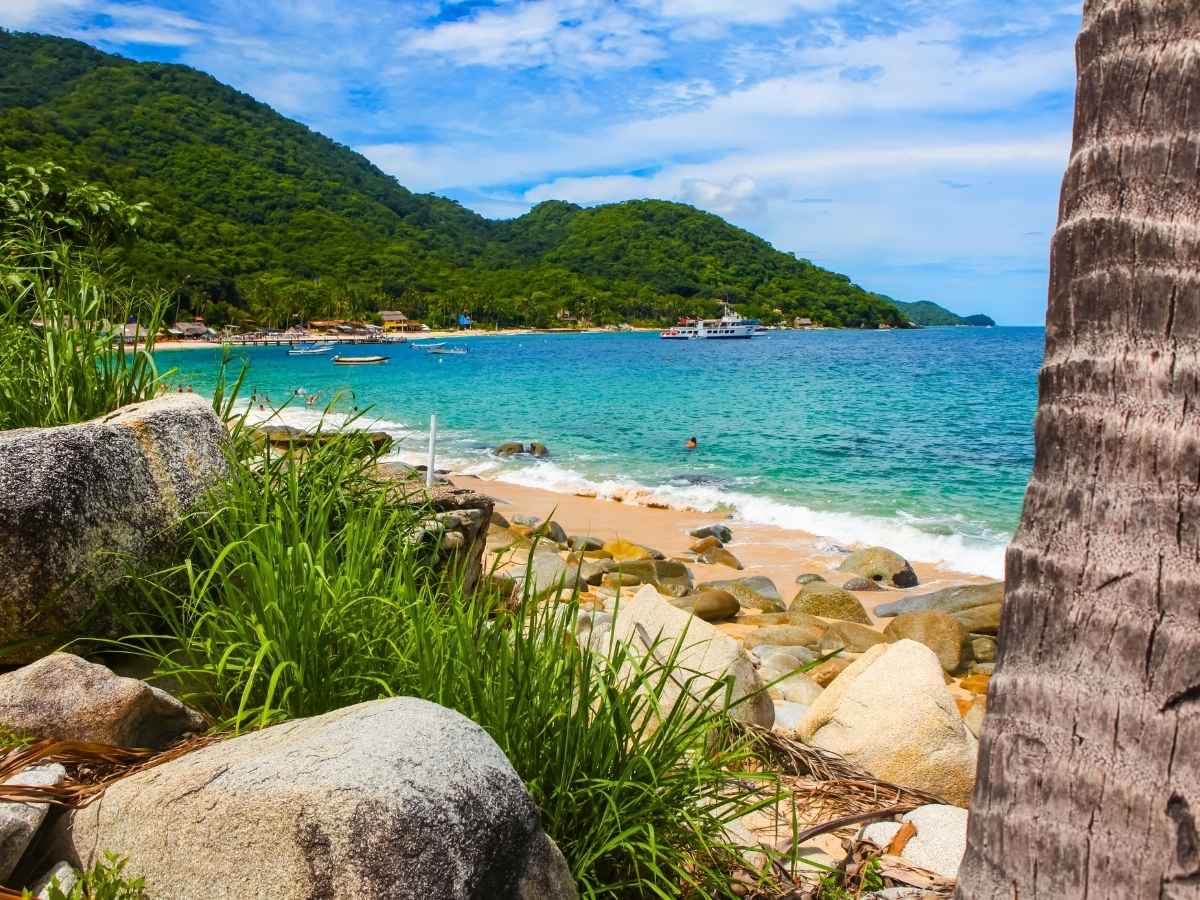 Playa Las Animas beach near Puerto Vallarta, Mexico with the mountains in the background