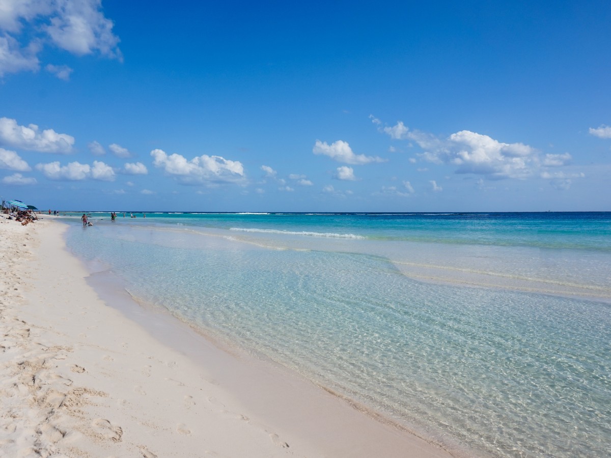 Turquoise water and gentle waves at Playa Xcacel in Riviera Maya Mexico